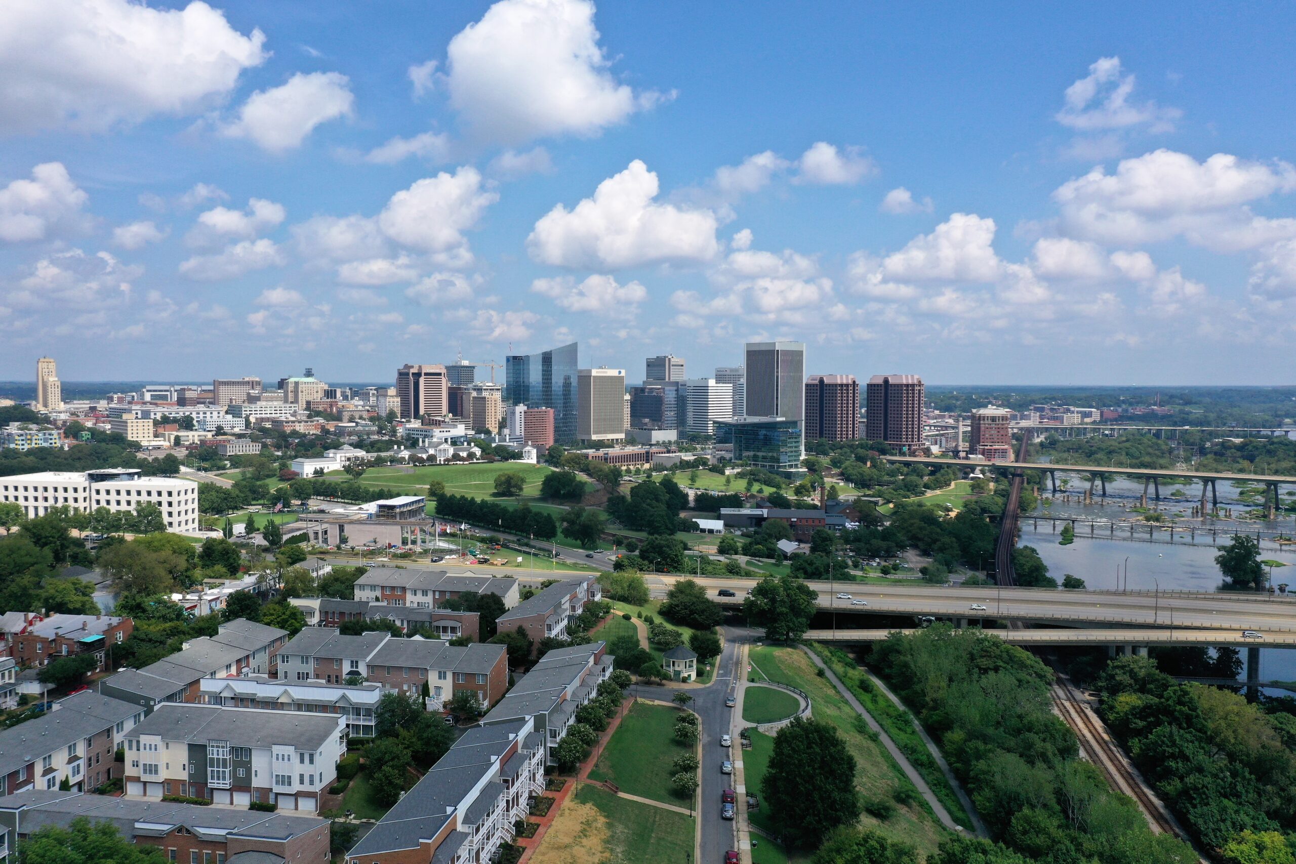A beautiful shot of Richmond, Virginia skyline with a cloudy blue sky in the background